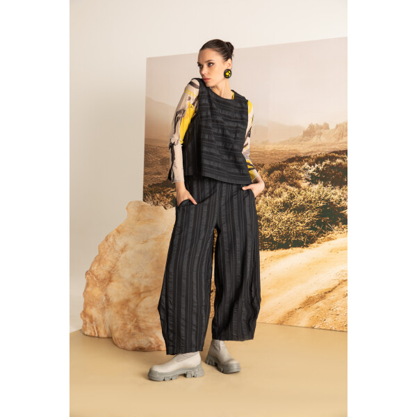 Kozan Alvin Pant Alloy styled with layered Kozan top