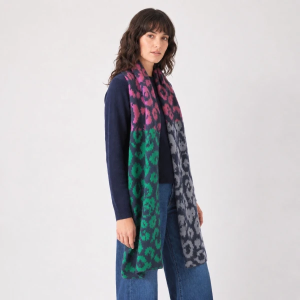 Navy leopard print heavyweight scarf styled with navy jumper and jeans